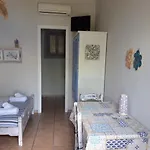 Ammos Papanero *